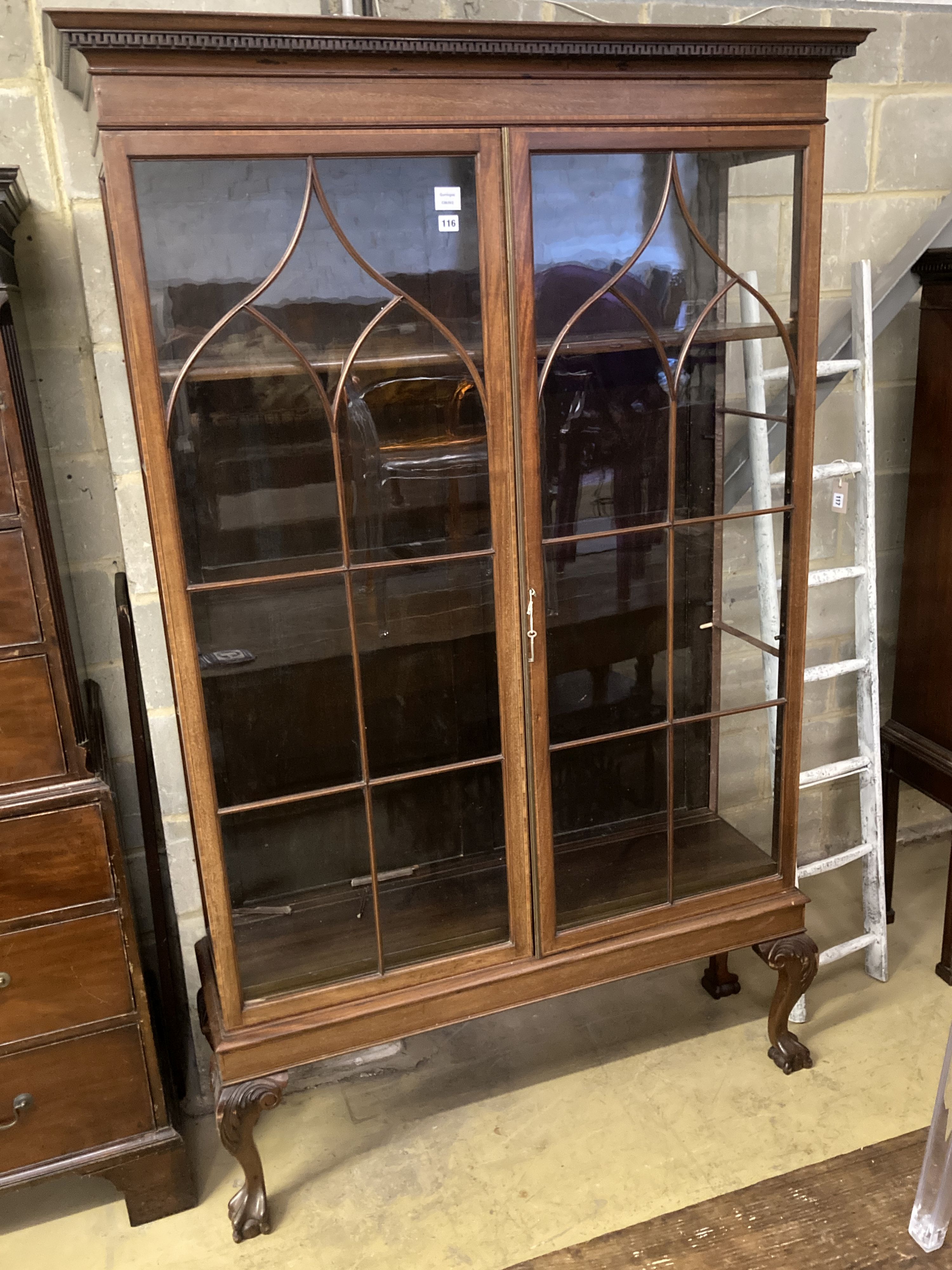 An Edwardian satinwood banded mahogany two door display cabinet, width 126cm, depth 39cm, height 204cm